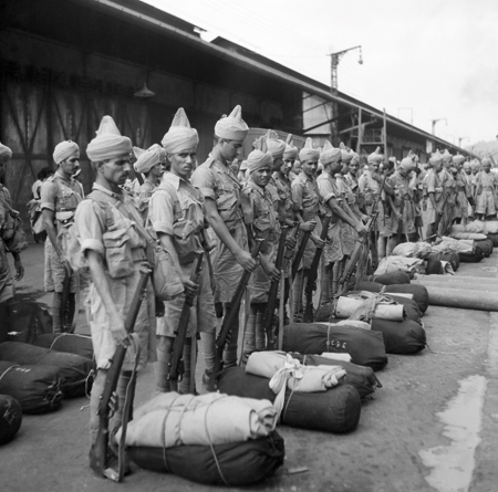 Newly-arrived Indian troops parade on the quayside at Singapore, November, 1941.