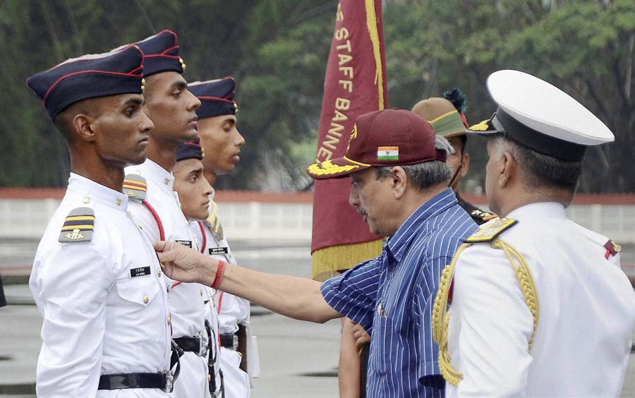 Union Defence Minister Manohar Parrikar reviewing the 128th Passing out Parade of National Defence Academy in Pune, Maharashtra on Saturday. PTI Photo (PTI5_30_2015_000113B)
