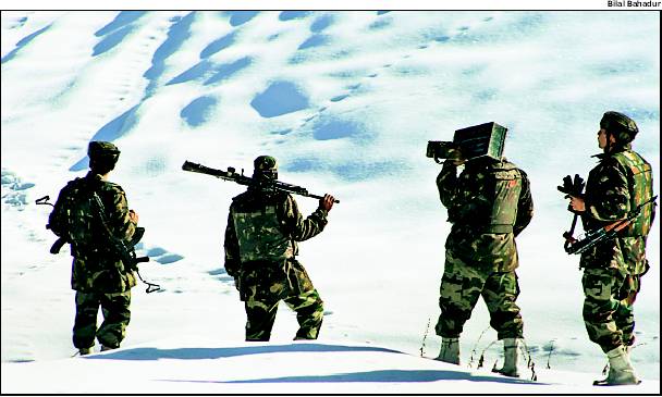 Army personnel on patrol in snow-bound Gulmarg